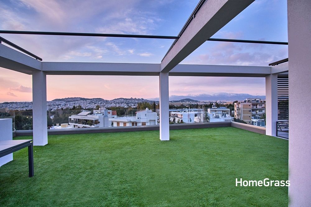 Πλαστικό γκαζόν τοποθέτηση σε ταράτσα στου Παπάγου - HomeGrass