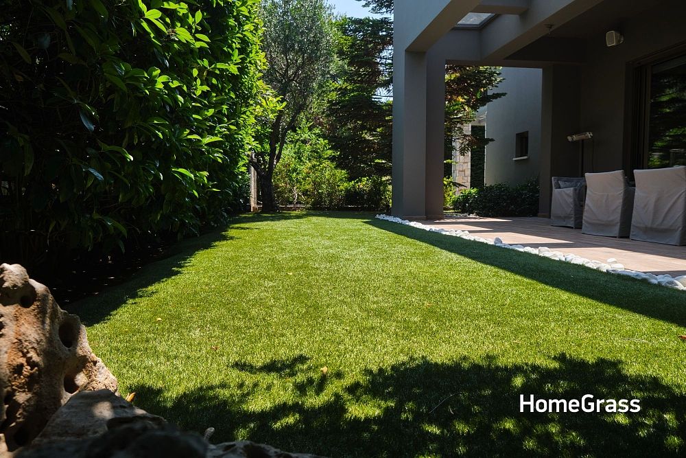 Τοποθέτηση συνθετικού χλοοτάπητα σε ιδιωτικό κήπο