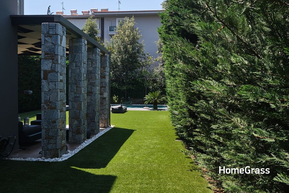 Τοποθέτηση συνθετικού χλοοτάπητα σε ιδιωτικό κήπο