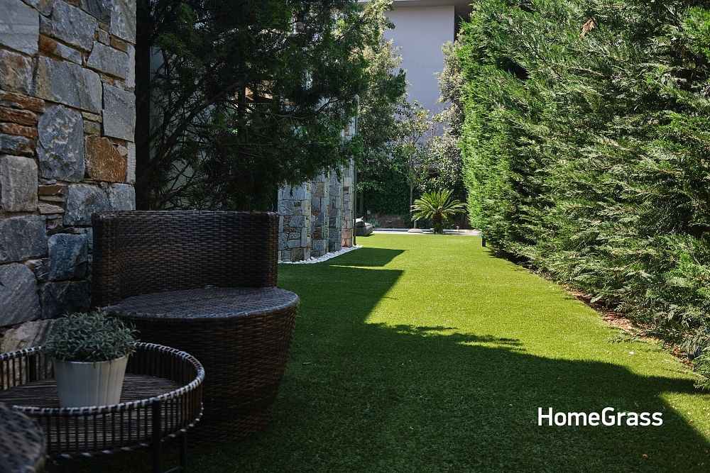 Τοποθέτηση συνθετικού χλοοτάπητα σε ιδιωτικό κήπο