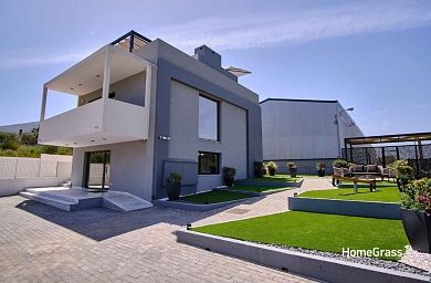 Γιατί να επιλέξετε τη HomeGrass για το τεχνητό γκαζόν σας
